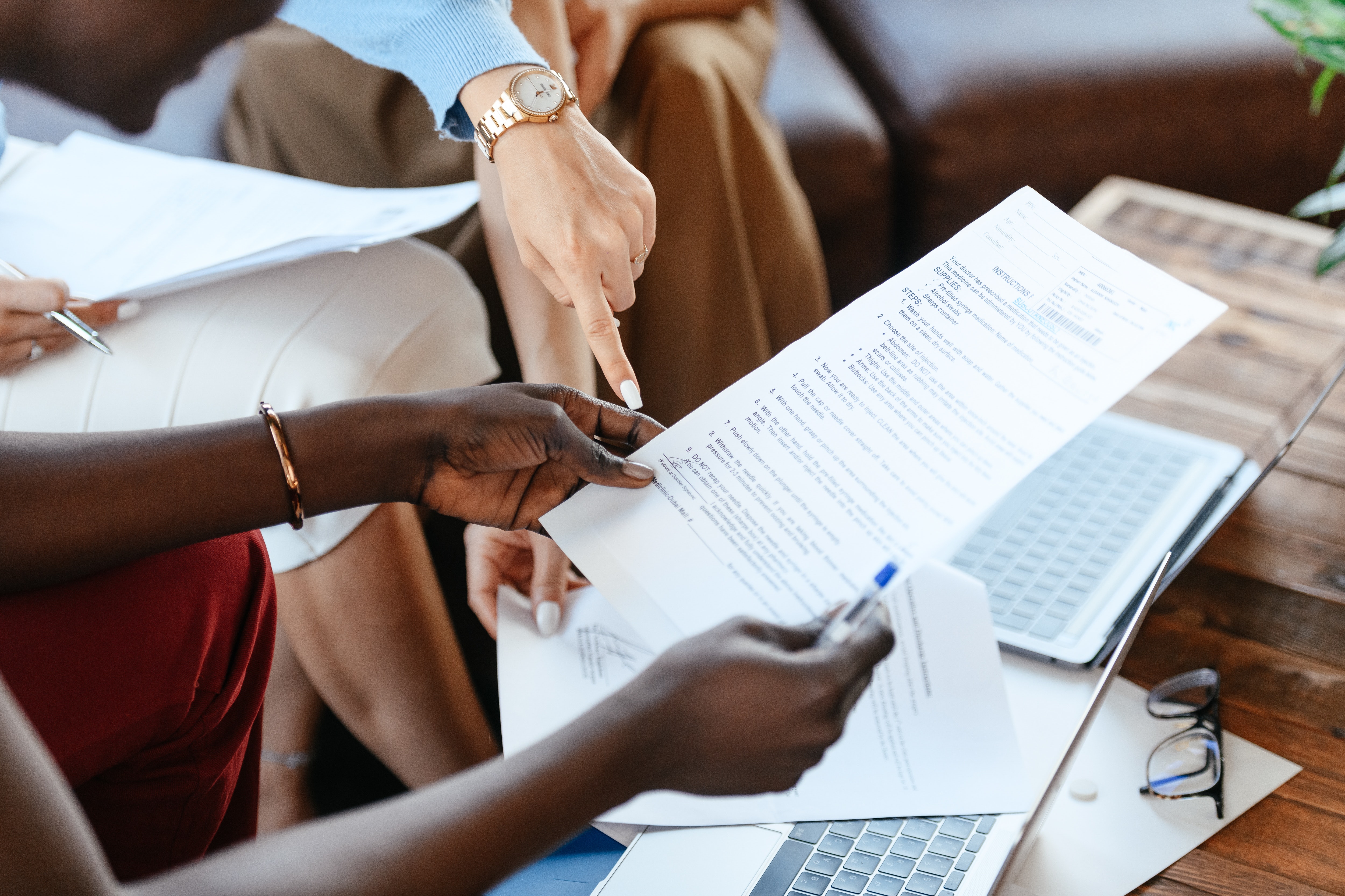 Two people reviewing a document